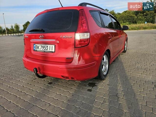 Красный Хендай i30, объемом двигателя 1.58 л и пробегом 299 тыс. км за 6200 $, фото 8 на Automoto.ua