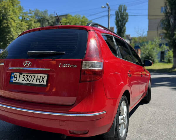 Красный Хендай i30, объемом двигателя 1.4 л и пробегом 302 тыс. км за 6000 $, фото 9 на Automoto.ua