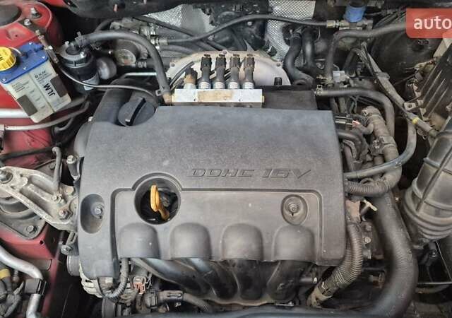 Красный Хендай i30, объемом двигателя 1.4 л и пробегом 189 тыс. км за 6500 $, фото 4 на Automoto.ua