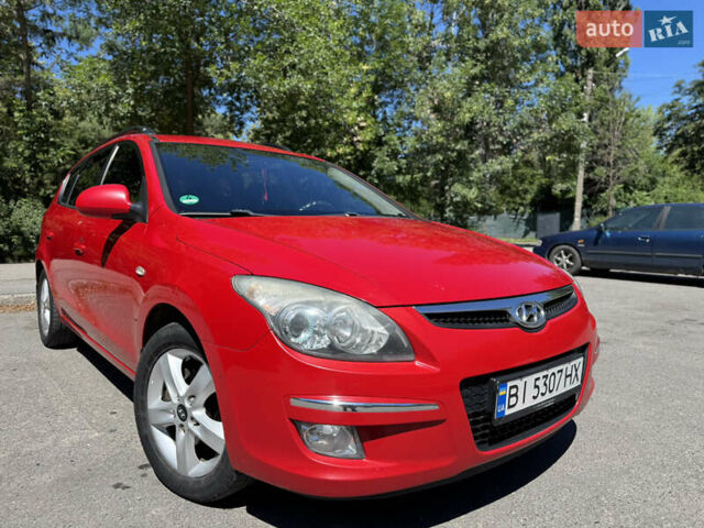 Красный Хендай i30, объемом двигателя 1.4 л и пробегом 302 тыс. км за 6000 $, фото 19 на Automoto.ua