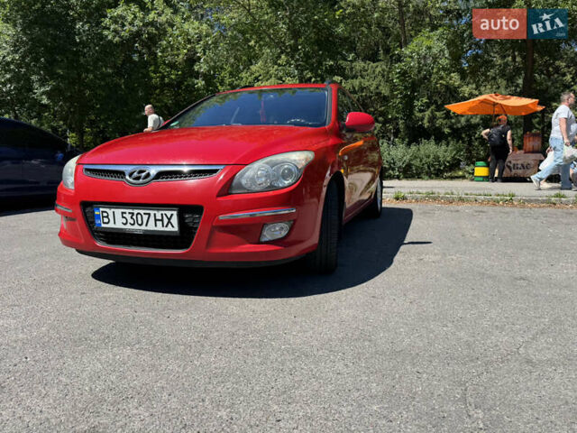 Красный Хендай i30, объемом двигателя 1.4 л и пробегом 302 тыс. км за 6000 $, фото 8 на Automoto.ua