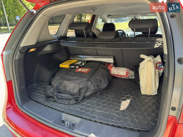 Красный Хендай i30, объемом двигателя 1.4 л и пробегом 302 тыс. км за 6000 $, фото 12 на Automoto.ua