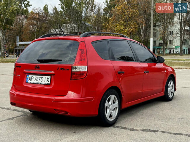 Червоний Хендай i30, об'ємом двигуна 1.4 л та пробігом 218 тис. км за 6200 $, фото 7 на Automoto.ua
