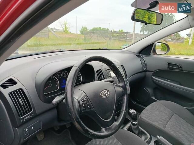 Красный Хендай i30, объемом двигателя 1.4 л и пробегом 149 тыс. км за 7200 $, фото 13 на Automoto.ua