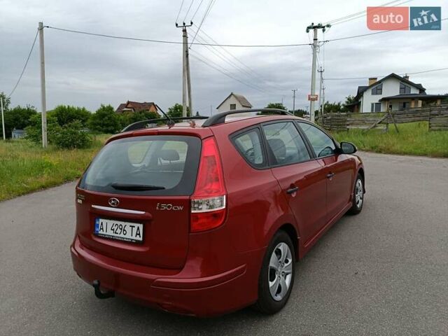 Красный Хендай i30, объемом двигателя 1.4 л и пробегом 149 тыс. км за 7200 $, фото 3 на Automoto.ua