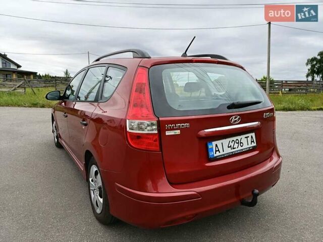 Красный Хендай i30, объемом двигателя 1.4 л и пробегом 149 тыс. км за 7200 $, фото 5 на Automoto.ua
