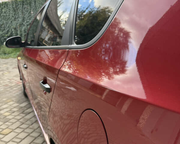 Красный Хендай i30, объемом двигателя 1.6 л и пробегом 196 тыс. км за 7200 $, фото 21 на Automoto.ua