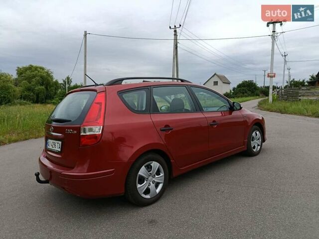 Красный Хендай i30, объемом двигателя 1.4 л и пробегом 149 тыс. км за 7200 $, фото 2 на Automoto.ua