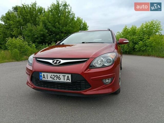 Красный Хендай i30, объемом двигателя 1.4 л и пробегом 149 тыс. км за 7200 $, фото 7 на Automoto.ua