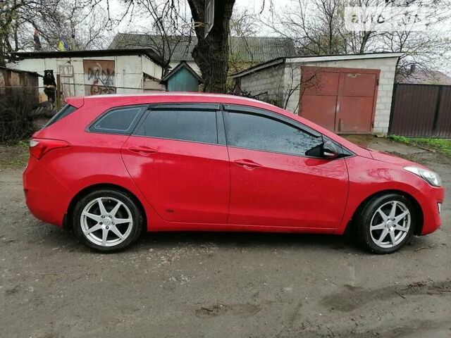 Червоний Хендай i30, об'ємом двигуна 1.6 л та пробігом 220 тис. км за 8500 $, фото 2 на Automoto.ua