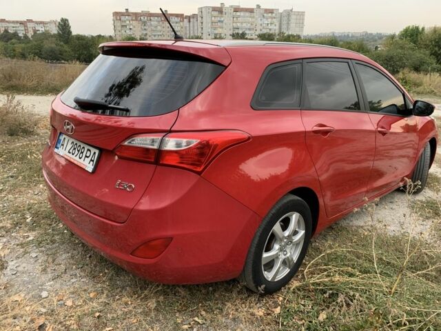 Червоний Хендай i30, об'ємом двигуна 1.6 л та пробігом 135 тис. км за 8300 $, фото 1 на Automoto.ua
