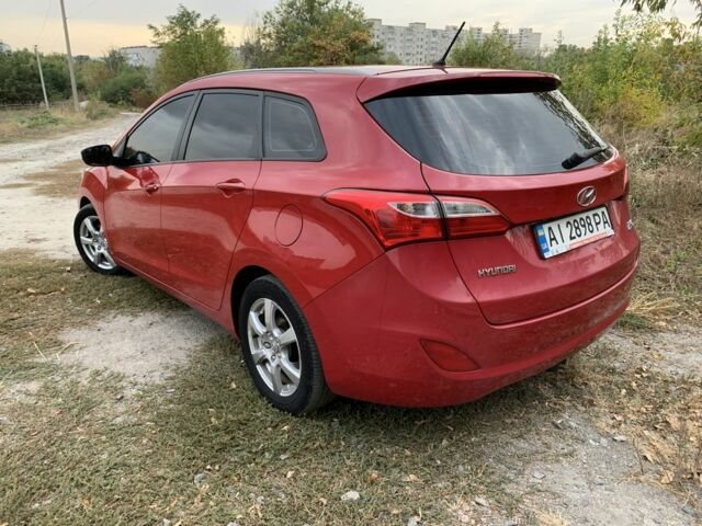 Червоний Хендай i30, об'ємом двигуна 1.6 л та пробігом 135 тис. км за 8300 $, фото 2 на Automoto.ua