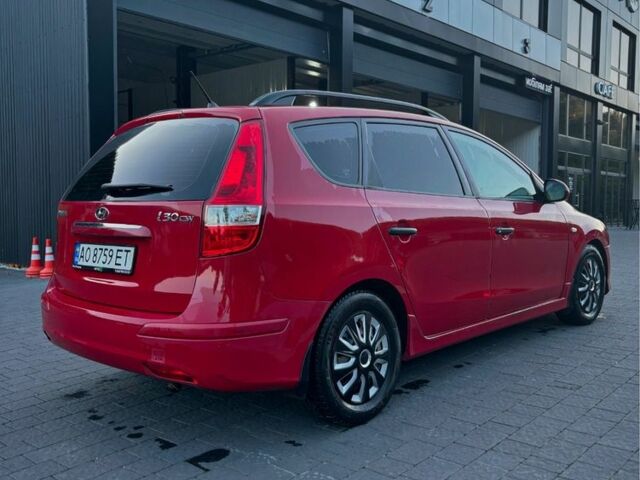 Красный Хендай i30, объемом двигателя 1.4 л и пробегом 230 тыс. км за 6800 $, фото 4 на Automoto.ua
