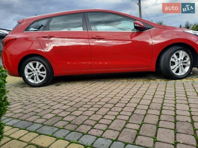 Червоний Хендай i30, об'ємом двигуна 1.6 л та пробігом 125 тис. км за 9250 $, фото 3 на Automoto.ua