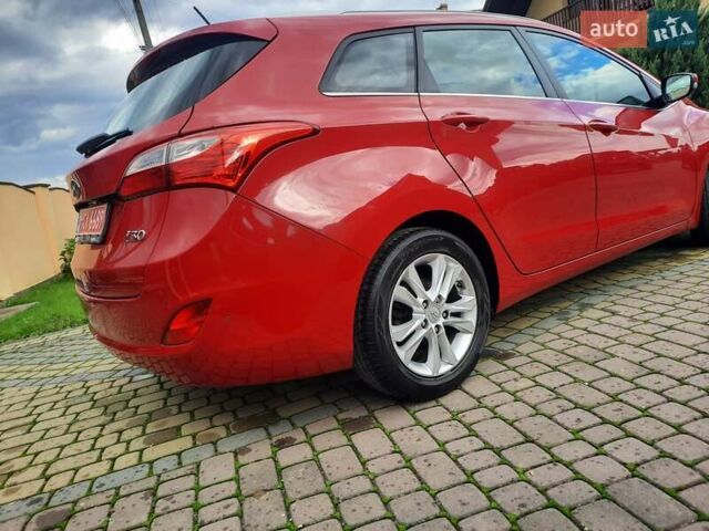 Червоний Хендай i30, об'ємом двигуна 1.6 л та пробігом 125 тис. км за 9250 $, фото 9 на Automoto.ua