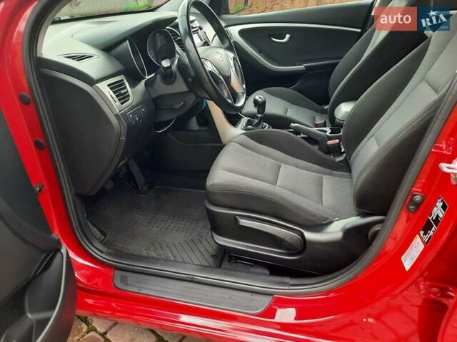 Червоний Хендай i30, об'ємом двигуна 1.6 л та пробігом 125 тис. км за 9250 $, фото 18 на Automoto.ua