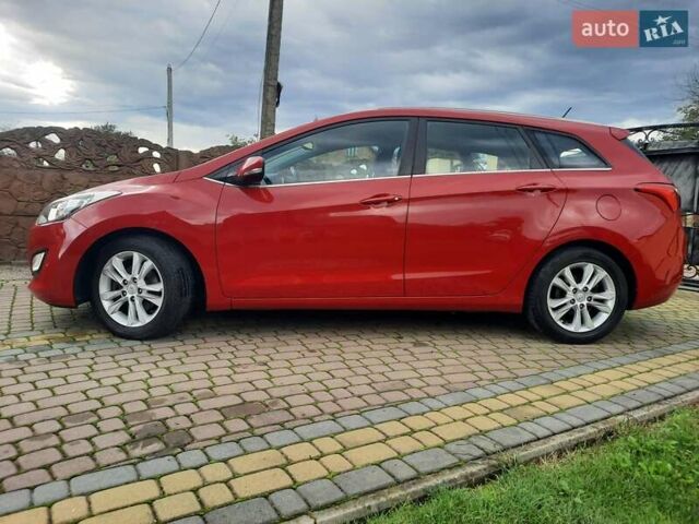 Червоний Хендай i30, об'ємом двигуна 1.6 л та пробігом 125 тис. км за 9250 $, фото 12 на Automoto.ua