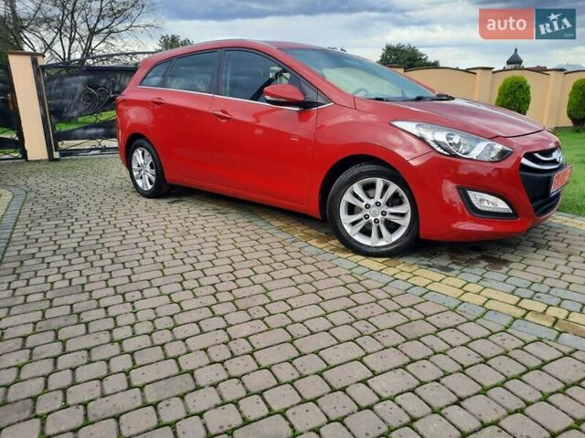 Червоний Хендай i30, об'ємом двигуна 1.6 л та пробігом 125 тис. км за 9250 $, фото 8 на Automoto.ua