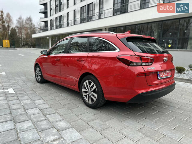 Красный Хендай i30, объемом двигателя 1.4 л и пробегом 240 тыс. км за 10500 $, фото 3 на Automoto.ua