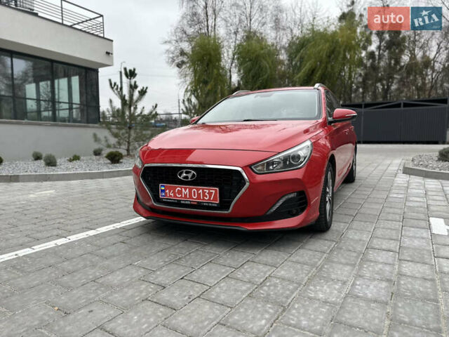 Красный Хендай i30, объемом двигателя 1.4 л и пробегом 240 тыс. км за 10500 $, фото 1 на Automoto.ua