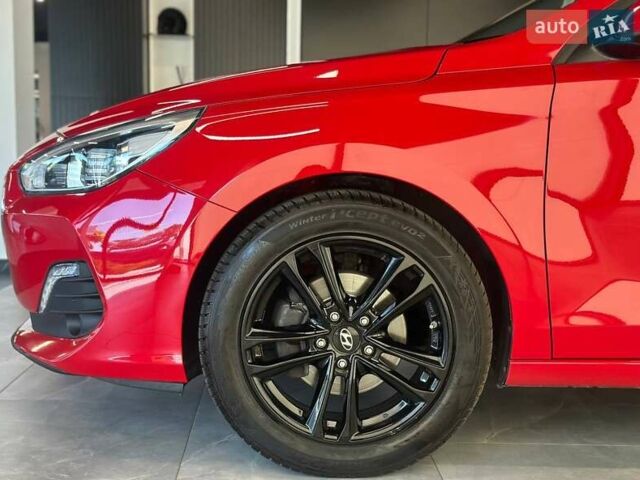 Красный Хендай i30, объемом двигателя 1.58 л и пробегом 108 тыс. км за 16490 $, фото 5 на Automoto.ua