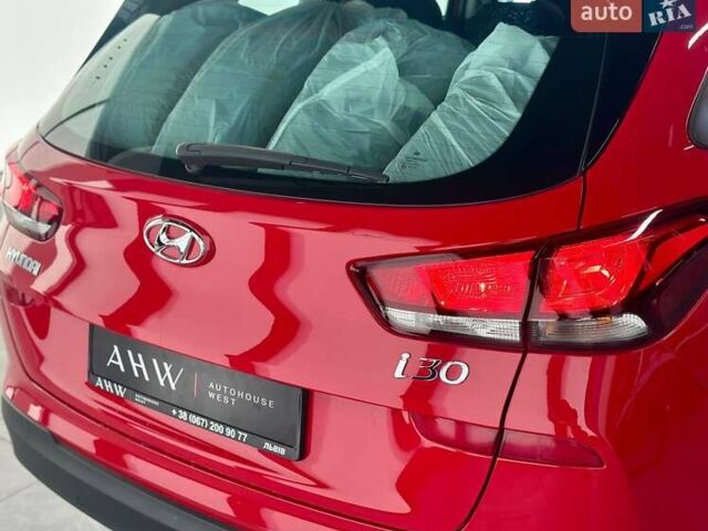 Красный Хендай i30, объемом двигателя 1.58 л и пробегом 108 тыс. км за 16490 $, фото 14 на Automoto.ua