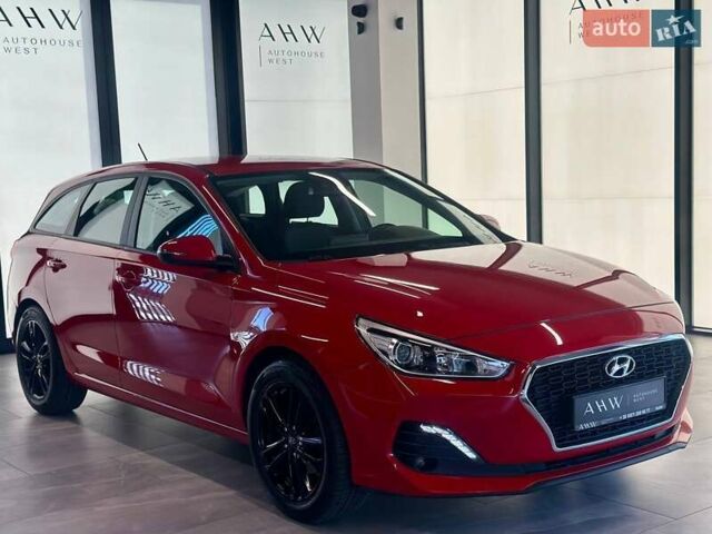 Красный Хендай i30, объемом двигателя 1.58 л и пробегом 108 тыс. км за 15990 $, фото 6 на Automoto.ua