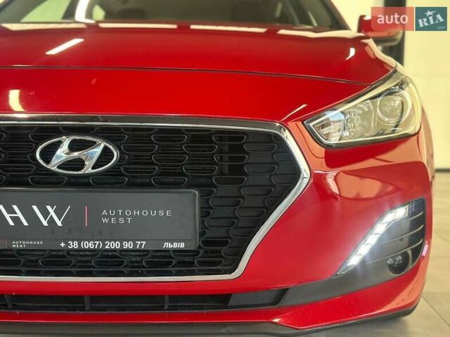 Червоний Хендай i30, об'ємом двигуна 1.58 л та пробігом 108 тис. км за 16490 $, фото 3 на Automoto.ua