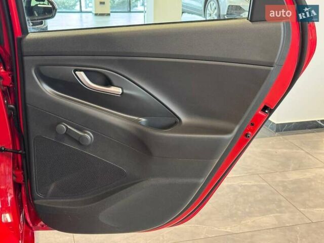 Червоний Хендай i30, об'ємом двигуна 1.58 л та пробігом 108 тис. км за 16490 $, фото 32 на Automoto.ua