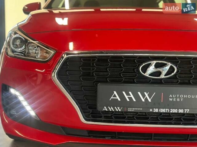 Червоний Хендай i30, об'ємом двигуна 1.58 л та пробігом 108 тис. км за 16490 $, фото 2 на Automoto.ua