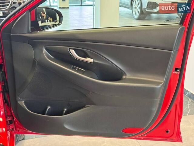 Червоний Хендай i30, об'ємом двигуна 1.58 л та пробігом 108 тис. км за 16490 $, фото 29 на Automoto.ua