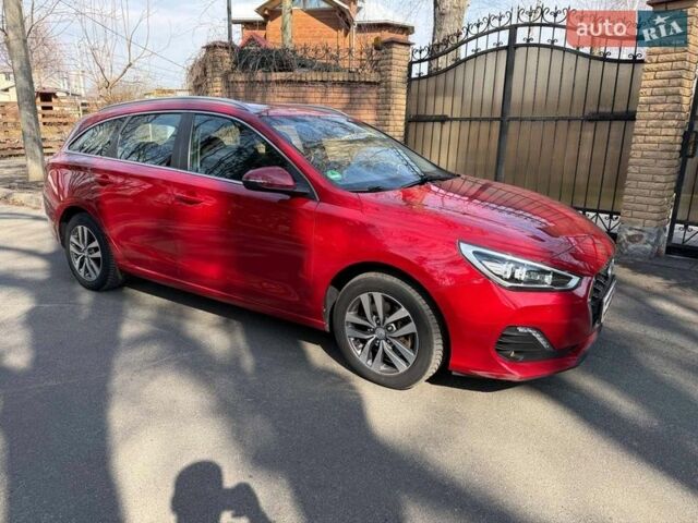 Красный Хендай i30, объемом двигателя 1.6 л и пробегом 184 тыс. км за 13440 $, фото 3 на Automoto.ua