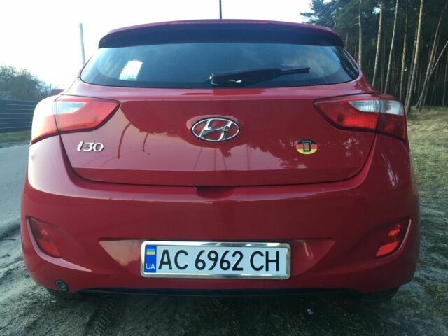 Червоний Хендай i30, об'ємом двигуна 1.4 л та пробігом 200 тис. км за 6700 $, фото 7 на Automoto.ua