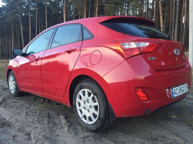 Червоний Хендай i30, об'ємом двигуна 1.4 л та пробігом 200 тис. км за 6700 $, фото 1 на Automoto.ua