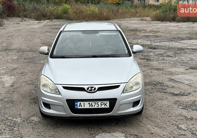 Серый Хендай i30, объемом двигателя 1.4 л и пробегом 265 тыс. км за 4500 $, фото 7 на Automoto.ua