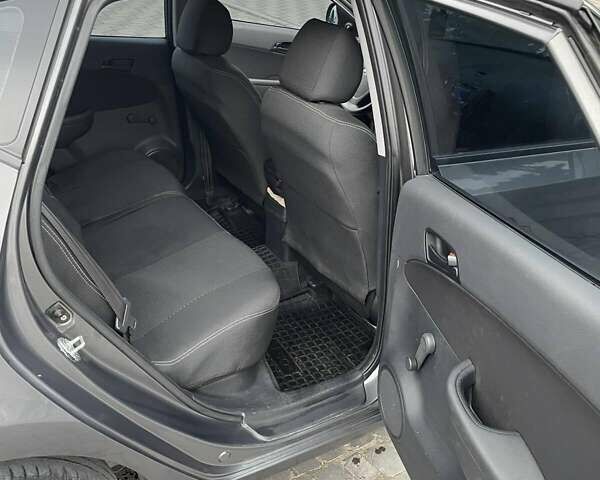 Сірий Хендай i30, об'ємом двигуна 1.4 л та пробігом 170 тис. км за 5000 $, фото 3 на Automoto.ua