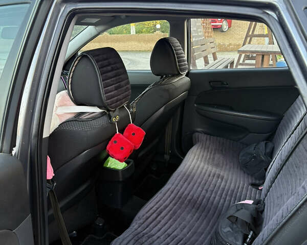 Серый Хендай i30, объемом двигателя 1.4 л и пробегом 222 тыс. км за 6000 $, фото 8 на Automoto.ua