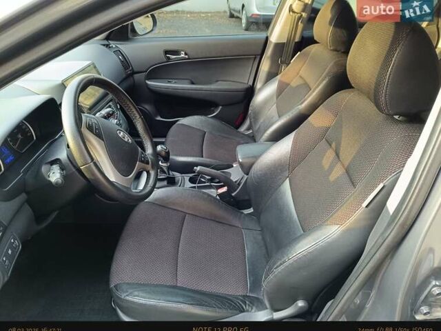 Серый Хендай i30, объемом двигателя 1.4 л и пробегом 178 тыс. км за 7400 $, фото 52 на Automoto.ua