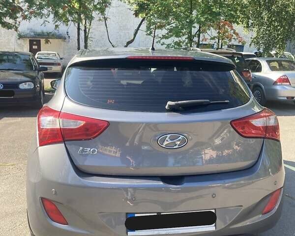 Сірий Хендай i30, об'ємом двигуна 1.59 л та пробігом 196 тис. км за 8900 $, фото 7 на Automoto.ua