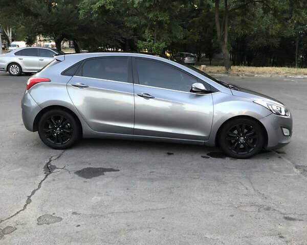 Серый Хендай i30, объемом двигателя 1.59 л и пробегом 202 тыс. км за 8500 $, фото 3 на Automoto.ua