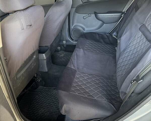 Серый Хендай i30, объемом двигателя 1.58 л и пробегом 245 тыс. км за 6999 $, фото 7 на Automoto.ua