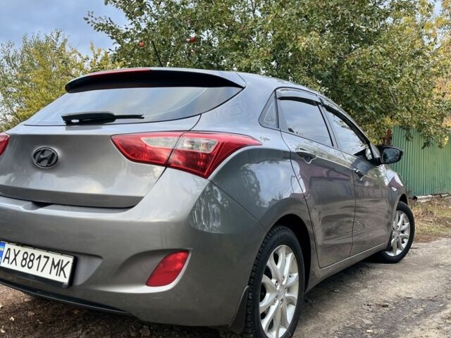 Серый Хендай i30, объемом двигателя 1.4 л и пробегом 140 тыс. км за 6900 $, фото 4 на Automoto.ua