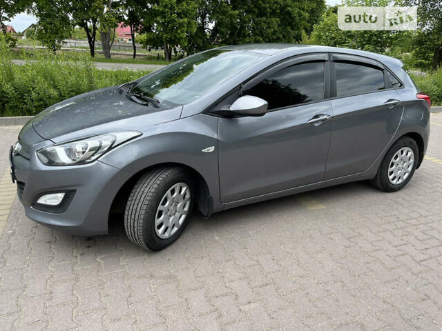 Сірий Хендай i30, об'ємом двигуна 1.4 л та пробігом 132 тис. км за 9450 $, фото 2 на Automoto.ua