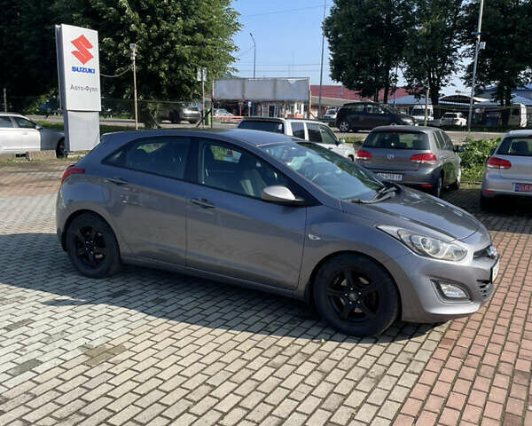 Серый Хендай i30, объемом двигателя 1.4 л и пробегом 182 тыс. км за 6700 $, фото 3 на Automoto.ua