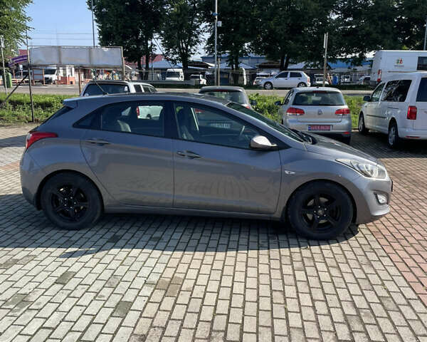 Серый Хендай i30, объемом двигателя 1.4 л и пробегом 182 тыс. км за 6700 $, фото 1 на Automoto.ua