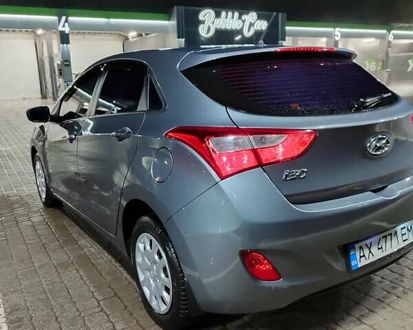 Серый Хендай i30, объемом двигателя 1.4 л и пробегом 82 тыс. км за 8400 $, фото 4 на Automoto.ua
