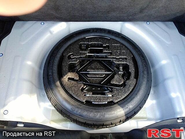 Хендай i30 2013 у Херсоні на Automoto.ua Сірий Хендай i30, об'ємом двигуна 1.4 л та пробігом 86 тис. км за 9500 $, фото 8 на Automoto.ua