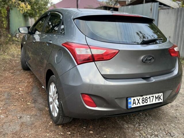 Серый Хендай i30, объемом двигателя 1.4 л и пробегом 140 тыс. км за 6900 $, фото 6 на Automoto.ua