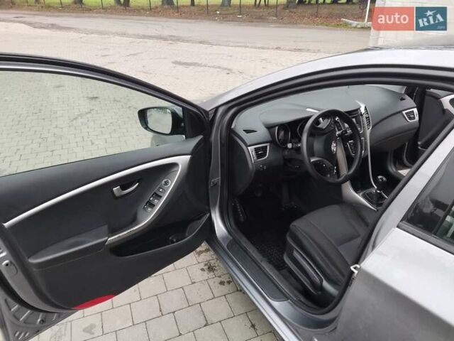 Серый Хендай i30, объемом двигателя 1.4 л и пробегом 77 тыс. км за 9100 $, фото 9 на Automoto.ua