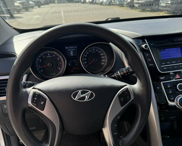 Серый Хендай i30, объемом двигателя 1.4 л и пробегом 254 тыс. км за 7500 $, фото 12 на Automoto.ua
